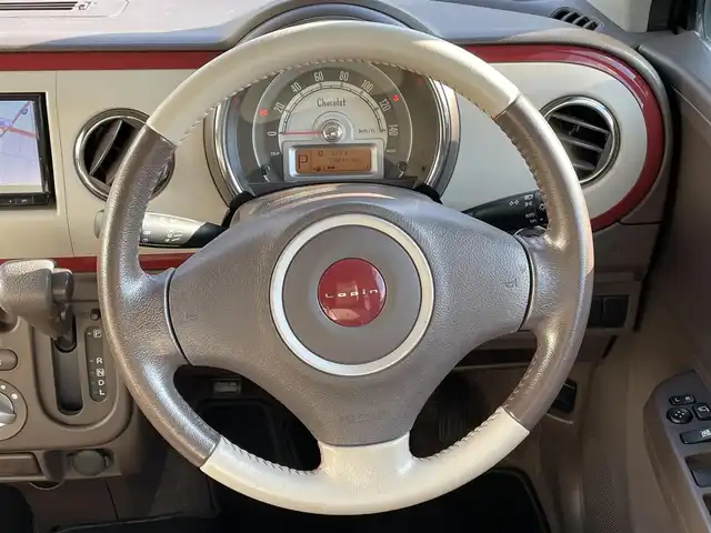 スズキ ラパン ショコラ G 岡山県 2013(平25)年 7.7万km アーバンブラウンパールメタリック 登録時走行距離76891km/社外ＳＤナビ/(AM/FM/DISC/BT/TV)/USB入力端子/パワーウィンドウ/パワーステアリング/キセノンヘッドライト/革シート/プッシュスタート/スマートキー/保証書/取扱説明書/記録簿