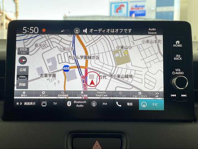 ホンダ ヴェゼル ハイブリッド e:HEV Z 兵庫県 2025(令7)年 0.1万km未満 プラチナホワイトパール ・純正9インチナビ（フルセグ・BT）/・バックカメラ/・レーダークルーズコントロール/・レーンキープアシスト/・衝突軽減ブレーキ/・路外逸脱抑制機能/・先行車発進お知らせ機能/・標識認識機能/・オートハイビーム/・パーキングセンサーシステム/・誤発進抑制機能/・後方誤発進抑制機能/・トラフィックジャムアシスト/・ハーフレザー/・シートヒーター/・ステアリングヒーター/・ワイヤレス充電/・パワーバックドア/・パドルシフト/・LEDオートライト/・ビルトインETC/・電動パーキングブレーキ/・ブレーキホールド/・ダウンヒルアシストコントロール/・純正18インチアルミホイール/・カーテンエアバック/・スマートキー/・プッシュスタート
