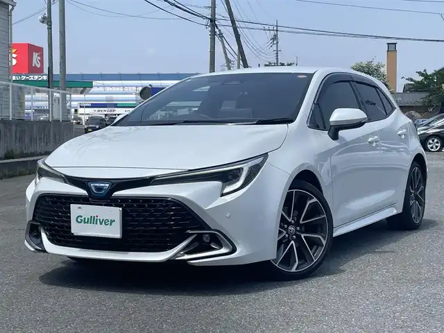 トヨタ カローラ スポーツ ハイブリッドG Z 群馬県 2023(令5)年 1.5万km プラチナホワイトパールマイカ ワンオーナー/純正ディスプレイオーディオ、地デジ/　　ミラーキャスト、Bluetooth/　Ｔコネクティッドナビ利用可（2028年３月まで）/バックカメラ/プリクラッシュセーフティ/レーダークルーズコントロール/ブラインドスポットモニター/レーンキープアシスト/オートマチックハイビーム/ＬＥＤヘッドライト/ウインカーミラー/ビルトインＥＴＣ２．０/前席シートヒーター/クリアランスソナー（前後）/ドアバイザー/スマートキー×２/整備手帳、取説
