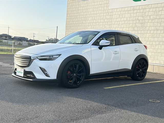 マツダ ＣＸ－３ XD ツーリング 香川県 2016(平28)年 5万km クリスタルホワイトパールマイカ 純正ナビ/・フルセグTV/・CD再生/・DVD再生/・Bluetooth接続/・バックカメラ/セーフティクルーズパッケージ／/・車線逸脱警報システム/・マツダレーダークルーズコントロール/・スマート・ブレーキ・サポート/・ハイ・ビーム・コントロールシステム/車高調/ブラインドスポットモニター/ヘッドアップディスプレイ/革巻きステアリング/社外１９インチアルミホイール/アイドリングストップ/プッシュスタート/LEDヘッドライト/ドアバイザー/ＥＴＣ/オートライト