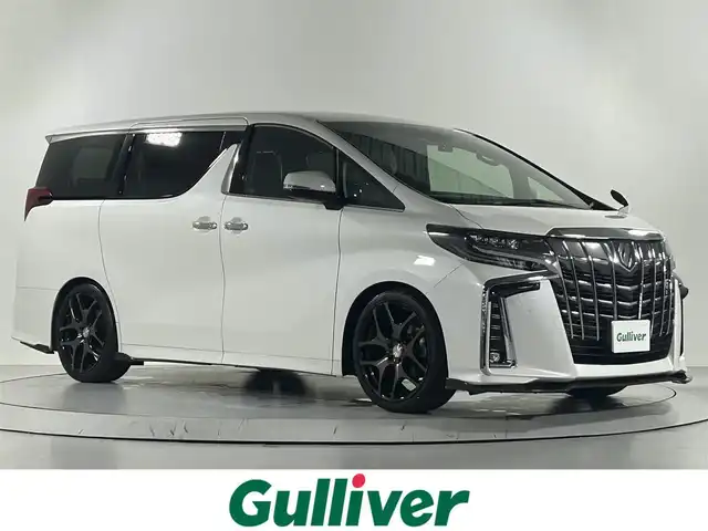 トヨタ アルファード S Cパッケージ 佐賀県 2020(令2)年 1.9万km ホワイトパールクリスタルシャイン アルパイン製11インチナビ/フルセグTV/CD/DVD/Bluetooth/アルパイン製12.8インチフリップダウンモニター/衝突被害軽減システム/バックカメラ/サイドカメラ/レーダークルーズコントロール/レーンアシスト/ロードサインアシスト/クリアランスソナー/オートマチックハイビーム/オートライト/前後ドライブレコーダー/3眼LEDヘッドライト/ETC2.0/両側パワースライドドア/パワーバックドア/合皮シート/運転席・助手席パワーシート/運転席メモリーシート/運転席・助手席シートヒーター/運転席・助手席エアシート/ステアリングヒーター/アルパイン製フロアマット/アルパイン製シートカバー/社外20インチアルミホイール/オートワイパー/スマートキー/スペアキー×１