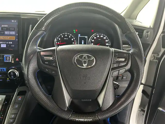トヨタ アルファード S Cパッケージ 佐賀県 2020(令2)年 1.9万km ホワイトパールクリスタルシャイン アルパイン製11インチナビ/フルセグTV/CD/DVD/Bluetooth/アルパイン製12.8インチフリップダウンモニター/衝突被害軽減システム/バックカメラ/サイドカメラ/レーダークルーズコントロール/レーンアシスト/ロードサインアシスト/クリアランスソナー/オートマチックハイビーム/オートライト/前後ドライブレコーダー/3眼LEDヘッドライト/ETC2.0/両側パワースライドドア/パワーバックドア/合皮シート/運転席・助手席パワーシート/運転席メモリーシート/運転席・助手席シートヒーター/運転席・助手席エアシート/ステアリングヒーター/アルパイン製フロアマット/アルパイン製シートカバー/社外20インチアルミホイール/オートワイパー/スマートキー/スペアキー×１