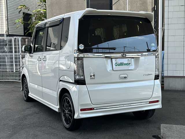 ホンダ Ｎ ＢＯＸ 2トーン カスタム ターボSSパッケージ 京都府 2017(平29)年 7.5万km プレミアムホワイトパールⅡ ケンウッドナビ/　(MDV-D304)　/ワンセグＴＶ　/CTBA/禁煙車　/両側電動スライドドア/バックカメラ　/ターボ　/クルーズコントロール/パドルシフト　/スマートキー　/ハーフレザー　/前席シートヒーター　/純正ＡＷ１５インチ　/ウィンカーミラー　/電格ミラー/純正ビルトインETC/パワーステアリング/パワーウィンドウ/AAC/CD再生機能/USB/AUX/リアスポイラー/横滑り防止/オートライト/フォグランプ/Wサイドエアバッグ/カーテンエアバッグ