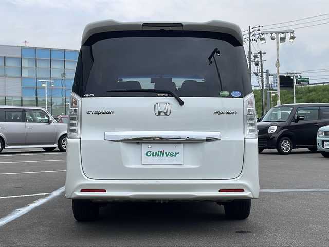 ホンダ ステップワゴン スパーダ Zi 青森県 2012(平24)年 9万km パール ・4WD/・寒冷地仕様/・純正ナビ/・BT接続/・バックカメラ/・３６０度カメラ/・フリップダウンモニター/・衝突軽減ブレーキ/・クルーズコントロール/・フロントガラスデアイサー/・アイドリングストップ/・ビルトインETC/・ステアリングリモコン/・パドルシフト/・革巻きステアリング/・両側パワースライド/・HIDオートライト/・フォグランプ/・純正16インチアルミホイール