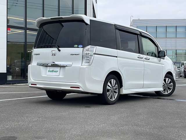ホンダ ステップワゴン スパーダ Zi 青森県 2012(平24)年 9万km パール ・4WD/・寒冷地仕様/・純正ナビ/・BT接続/・バックカメラ/・３６０度カメラ/・フリップダウンモニター/・衝突軽減ブレーキ/・クルーズコントロール/・フロントガラスデアイサー/・アイドリングストップ/・ビルトインETC/・ステアリングリモコン/・パドルシフト/・革巻きステアリング/・両側パワースライド/・HIDオートライト/・フォグランプ/・純正16インチアルミホイール