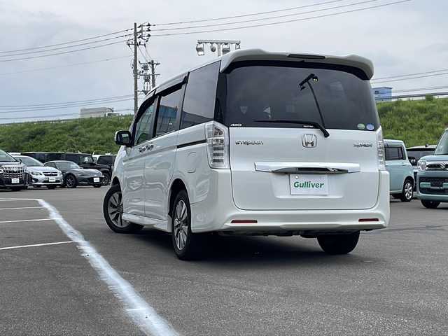 ホンダ ステップワゴン スパーダ Zi 青森県 2012(平24)年 9万km パール ・4WD/・寒冷地仕様/・純正ナビ/・BT接続/・バックカメラ/・３６０度カメラ/・フリップダウンモニター/・衝突軽減ブレーキ/・クルーズコントロール/・フロントガラスデアイサー/・アイドリングストップ/・ビルトインETC/・ステアリングリモコン/・パドルシフト/・革巻きステアリング/・両側パワースライド/・HIDオートライト/・フォグランプ/・純正16インチアルミホイール