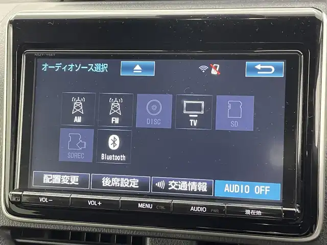 トヨタ ノア Si ダブルバイビー 熊本県 2018(平30)年 6万km ブラック 禁煙車　/ワンオーナー　/純正フリップダウンモニター　/純正ナビ（ＣＤ・ＤＶＤ・フルセグ・ＢＴ・ＳＤ・ＵＳＢ）/バックカメラ　/ビルトインＥＴＣ　/両側パワースライドドア　/前後クリアランスソナー　/衝突軽減ブレーキ/レーンキープアシスト/横滑り防止/アイドリングストップ/純正フロアマット/純正１６インチAW/オートライト/オートマチックハイビーム/フォグランプ/スマートキー/プッシュスタート/スペアキー1本/保証書/取扱説明書