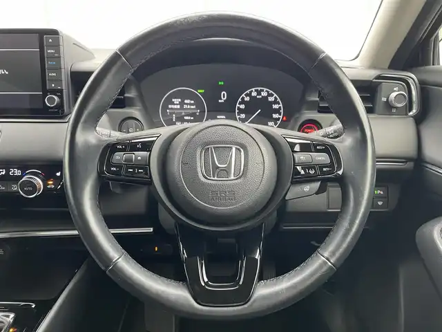 ホンダ ヴェゼル ハイブリッド e:HEV Z 山梨県 2021(令3)年 7.7万km メテオロイドグレーメタリック 純正ナビ(VXU-215VZi)/バックカメラ/パワーバックドア/ホンダセンシング/レーダークルーズコントロール/レーンキープアシスト/踏み間違い防止装置/衝突被害軽減ブレーキ/追突軽減ブレーキ/ヒルディセントコントロール/コーナーセンサー/横滑り防止装置/ハーフレザーシート/前席シートヒーター/スマートキー/プッシュスタート/純正AW18インチ/LEDヘッドライト/カーテンエアバッグ