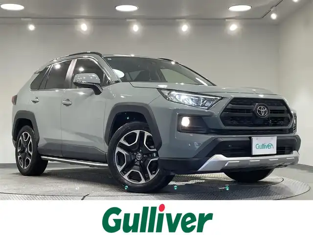 トヨタ ＲＡＶ４ アドベンチャー 愛知県 2021(令3)年 5.2万km アーバンカーキ 純正９インチディスプレイオーディオ　/（AM/FM/Bluetooth/USB/Miracast/スマホ連携/フルセグTV）/電動バックドア　/モデリスタサイドステップ　/ルーフレール　/トヨタセーフティセンス/　　-プリクラッシュセーフティ/　　-レーントレーニングアシスト/　　-レーダークルーズコントロール/　　-オートマチックハイビーム/　　-ロードサインアシスト/バックカメラ　　/ＬＥＤヘッドライト　/フォグランプ/ブラインドスポットモニター/クリアランスソナー/ダウンヒルアシストコントロール/電動パーキングブレーキ/D席パワーシート/純正フロアマット/純正19インチAW/プッシュスタート/　　-スマートキー