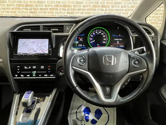 ホンダ シャトル ハイブリッド X スタイルED 岩手県 2016(平28)年 7.1万km クリスタルブラックパール ４WD/ラルグス製車高調/あんしんパッケージ/クルーズコントロール/シティブレーキサポート/横滑り防止装置/パドルシフト/純正ナビ/フルセグTV/バックカメラ/ETC/ステアリングスイッチ/LEDヘッドライト/LEDフォグライト/チップアップリヤシート/熱線入りフロントウインドウ/本革巻きステアリング/15インチスチールホイール/純正ホイールキャップ