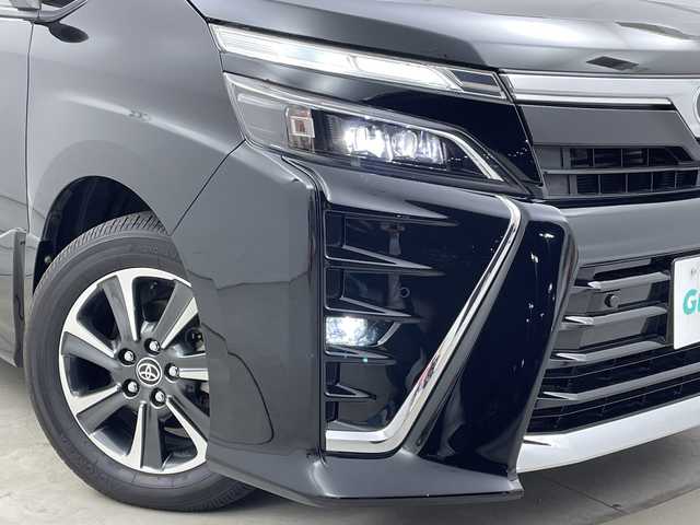 トヨタ ヴォクシー ZS 煌Ⅱ 新潟県 2019(平31)年 5.2万km ブラック ワンオーナー/カロッツェリアメモリナビ/　フルセグTV/Bluetooth/USB/HDMI/衝突被害軽減ブレーキ/レーンキープアシスト/クルーズコントロール/両側パワースライドドア/フリップダウンモニター/バックカメラ/ビルトインETC/コーナーセンサー/アイドリングストップ/レザー調シートカバー/LEDヘッドライト/オートマチックハイビーム/オートライト/ドアバイザー/保証書/取扱説明書/スマートキー