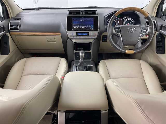 トヨタ ランドクルーザー プラド TX Lパッケージ 道央・札幌 2021(令3)年 3万km ホワイトパールクリスタルシャイン ・4WD/・寒冷地仕様/・社外ナビ/　CD/DVD/BT/USB/・フルセグTV/・バックカメラ/・後席モニター/・アダプティブクルーズコントロール/・TRD前後エアロ/・リアスポイラー/・サイドステップ/・前席パワーシート/・前席シートヒーター/・前席ベンチレーション/・電動格納サードシート/・純正エンジンスターター/・純正前後ドライブレコーダー/・レーンディパーチャーアシスト/・衝突軽減ブレーキ/・オートマチックハイビーム/・オートライト/・LEDヘッドライト/・フォグランプ/・リアフォグランプ/・ワイパーデアイサー/・19インチ純正アルミホイール/・ルーフレール/・ビルトインETC/・スペアキー/・保証書