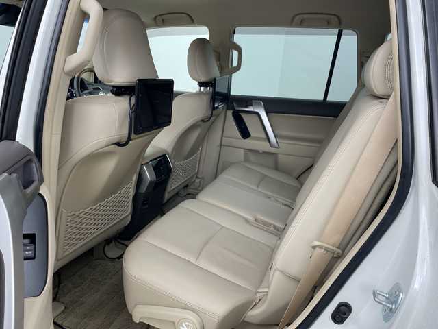 トヨタ ランドクルーザー プラド TX Lパッケージ 道央・札幌 2021(令3)年 3万km ホワイトパールクリスタルシャイン ・4WD/・寒冷地仕様/・社外ナビ/　CD/DVD/BT/USB/・フルセグTV/・バックカメラ/・後席モニター/・アダプティブクルーズコントロール/・TRD前後エアロ/・リアスポイラー/・サイドステップ/・前席パワーシート/・前席シートヒーター/・前席ベンチレーション/・電動格納サードシート/・純正エンジンスターター/・純正前後ドライブレコーダー/・レーンディパーチャーアシスト/・衝突軽減ブレーキ/・オートマチックハイビーム/・オートライト/・LEDヘッドライト/・フォグランプ/・リアフォグランプ/・ワイパーデアイサー/・19インチ純正アルミホイール/・ルーフレール/・ビルトインETC/・スペアキー/・保証書