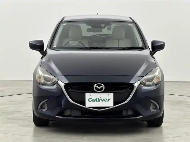 マツダ デミオ 13S Lパッケージ 福岡県 2014(平26)年 6万km ディープクリスタルブルーマイカ 純正ＳＤナビ　/ＥＴＣ　/前方ドライブレコーダー　/衝突被害軽減システム　/横滑り防止　/アイドリングストップ　/アクセル踏み間違い防止　/ＨＵＤ/レザーシート　/純正１５インチＡＷ　/純正フロアマット　/オートライト