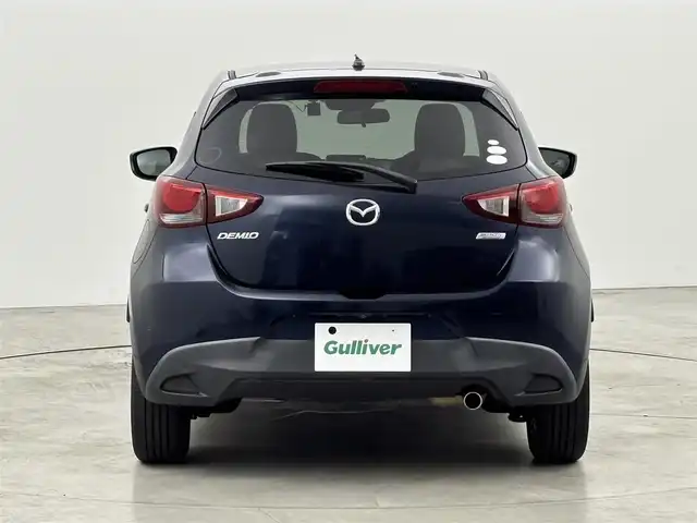 マツダ デミオ 13S Lパッケージ 福岡県 2014(平26)年 6万km ディープクリスタルブルーマイカ 純正ＳＤナビ　/ＥＴＣ　/前方ドライブレコーダー　/衝突被害軽減システム　/横滑り防止　/アイドリングストップ　/アクセル踏み間違い防止　/ＨＵＤ/レザーシート　/純正１５インチＡＷ　/純正フロアマット　/オートライト