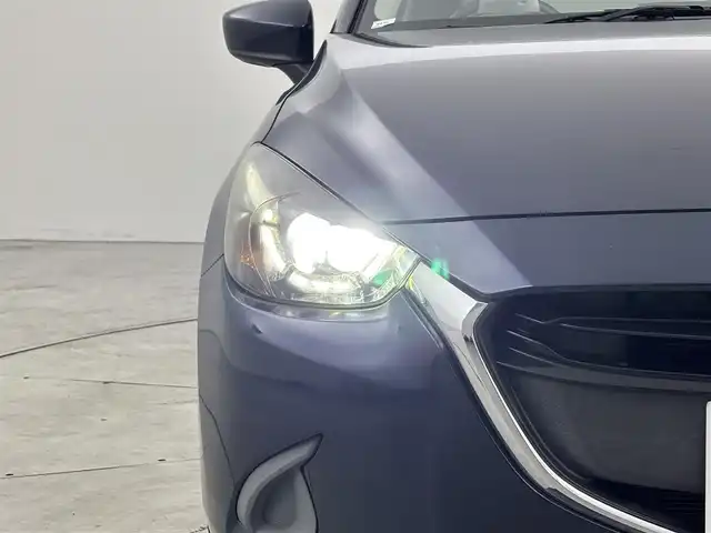 マツダ デミオ 13S Lパッケージ 福岡県 2014(平26)年 6万km ディープクリスタルブルーマイカ 純正ＳＤナビ　/ＥＴＣ　/前方ドライブレコーダー　/衝突被害軽減システム　/横滑り防止　/アイドリングストップ　/アクセル踏み間違い防止　/ＨＵＤ/レザーシート　/純正１５インチＡＷ　/純正フロアマット　/オートライト