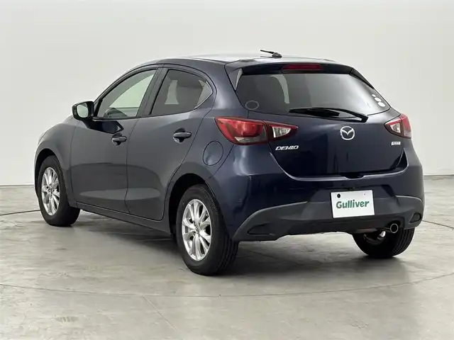 マツダ デミオ 13S Lパッケージ 福岡県 2014(平26)年 6万km ディープクリスタルブルーマイカ 純正ＳＤナビ　/ＥＴＣ　/前方ドライブレコーダー　/衝突被害軽減システム　/横滑り防止　/アイドリングストップ　/アクセル踏み間違い防止　/ＨＵＤ/レザーシート　/純正１５インチＡＷ　/純正フロアマット　/オートライト