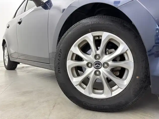 マツダ デミオ 13S Lパッケージ 福岡県 2014(平26)年 6万km ディープクリスタルブルーマイカ 純正ＳＤナビ　/ＥＴＣ　/前方ドライブレコーダー　/衝突被害軽減システム　/横滑り防止　/アイドリングストップ　/アクセル踏み間違い防止　/ＨＵＤ/レザーシート　/純正１５インチＡＷ　/純正フロアマット　/オートライト