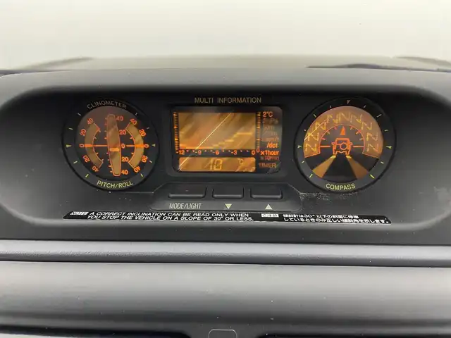 トヨタ ランドクルーザー プラド TX ワイド 熊本県 1999(平11)年 10.6万km シルバーM/シルバーM 禁煙車　/４ＷＤ　/社外ナビ（ＣＤ・ＤＶＤ・フルセグ・ＢＴ）/バックカメラ　/ＥＴＣ　/社外フロアマット　/社外１６インチＡＷ　/ルーフレール　/背面タイヤ/電動格納ミラー