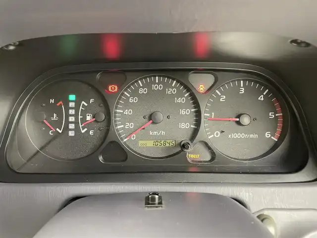 トヨタ ランドクルーザー プラド TX ワイド 熊本県 1999(平11)年 10.6万km シルバーM/シルバーM 禁煙車　/４ＷＤ　/社外ナビ（ＣＤ・ＤＶＤ・フルセグ・ＢＴ）/バックカメラ　/ＥＴＣ　/社外フロアマット　/社外１６インチＡＷ　/ルーフレール　/背面タイヤ/電動格納ミラー