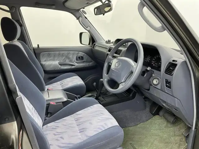 トヨタ ランドクルーザー プラド TX ワイド 熊本県 1999(平11)年 10.6万km シルバーM/シルバーM 禁煙車　/４ＷＤ　/社外ナビ（ＣＤ・ＤＶＤ・フルセグ・ＢＴ）/バックカメラ　/ＥＴＣ　/社外フロアマット　/社外１６インチＡＷ　/ルーフレール　/背面タイヤ/電動格納ミラー