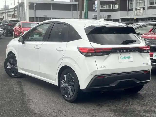 日産 ノート e－パワー X FOUR 島根県 2023(令5)年 6.7万km ピュアホワイトパール 4WD/プロパイロット　/・レーダークルーズコントロール/・レーンアシスト/純正９インチナビ　/(AM/FM/フルセグTV/Ｂｌｕｅｔｏｏｔｈ接続)/全方位／バックカメラ　/ビルトインＥＴＣ2.0　/インテリジェント エマージェンシーブレーキ　/後側方車両検知警報/前後コーナーセンサー/前席シートヒーター　/ステアリングヒーター/電動パーキングブレーキ/オートホールド　/デジタルインナーミラー/置くだけ充電　/オートハイビーム／ライト　/純正フロアマット/保証書・取扱説明書（本体＋ナビ）