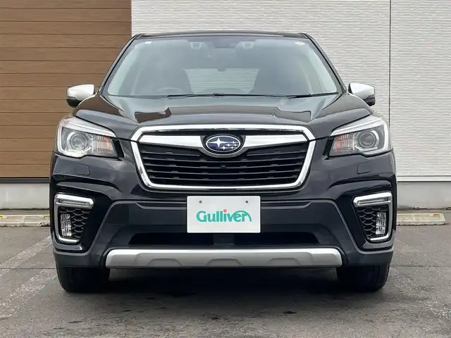 スバル フォレスター ハイブリッド アドバンス 秋田県 2019(平31)年 7.1万km クリスタルブラックシリカ ４WD/衝突軽減システム/LEDヘッドライト/純正SDナビ（DVD/CD/BT/AM/FM/USB）/フルセグ（走行中視聴不可能）/フロント/サイドカメラ/スバル純正１８インチアルミ（夏タイヤ装着）/スマートキー/アイドリングストップ/プッシュスタート/MTモード付AT/クルーズコントロール追従走行あり/レーンキープアシスト/コーナーセンサー/ダウンヒルアシストコントロール/ブラインドスポットモニター/ステアリングスイッチ/ステアリングヒーター/パドルシフト/前席パワーシート/運転席メモリ‐付パワーシート/全席シートヒーター/電動リアゲート/ドライブレコーダー/ビルトインETC/デジタルインナーミラー/電動パーキングブレーキ/オートブレーキホールド機能/純正フロアマット/純正ドアバイザー/オートライト/オートエアコン/パワーステアリング/パワーウィンドウ/ヘッドライトレベライザー/電動格納ウィンカーミラー/横滑り防止/盗難防止装置/寒冷地仕様/保証書/取扱説明書/記録簿/スペアキー×１
