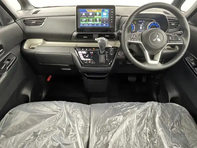 三菱 デリカミニ T プレミアム 群馬県 2025(令7)年 0.1千km パールⅡ 届出済未使用車　純正９インチディスプレイオーディオ　アラウンドビューモニター　マイパイロット　両側パワースライドドア　ＬＥＤライト　ＡＨＢ　シートヒーター　純正１５インチＡＷ　ステアリングヒーター