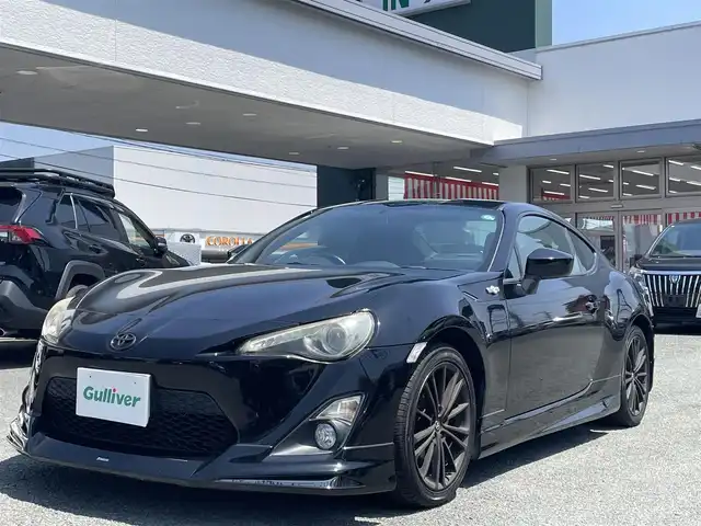 トヨタ ８６ GT 熊本県 2012(平24)年 6.7万km クリスタルブラックシリカ モデリスタフルエアロ /社外SDナビ(AVN-R7W)/【フルセグTV/SD/CD/DVD/Bluetooth】/バックカメラ/オートHIDライト/ETC/純正17インチAW/プッシュスタート/スマートキー/スペアキー/横滑り防止装置/盗難防止装置/純正フロアマット/ダブル＋サイドエアバック/取扱説明書/保証書