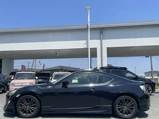 トヨタ ８６ GT 熊本県 2012(平24)年 6.7万km クリスタルブラックシリカ モデリスタフルエアロ /社外SDナビ(AVN-R7W)/【フルセグTV/SD/CD/DVD/Bluetooth】/バックカメラ/オートHIDライト/ETC/純正17インチAW/プッシュスタート/スマートキー/スペアキー/横滑り防止装置/盗難防止装置/純正フロアマット/ダブル＋サイドエアバック/取扱説明書/保証書