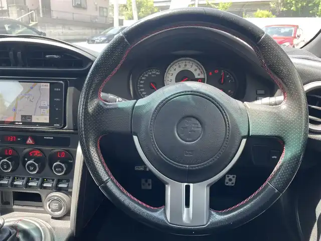 トヨタ ８６ GT 熊本県 2012(平24)年 6.7万km クリスタルブラックシリカ モデリスタフルエアロ /社外SDナビ(AVN-R7W)/【フルセグTV/SD/CD/DVD/Bluetooth】/バックカメラ/オートHIDライト/ETC/純正17インチAW/プッシュスタート/スマートキー/スペアキー/横滑り防止装置/盗難防止装置/純正フロアマット/ダブル＋サイドエアバック/取扱説明書/保証書