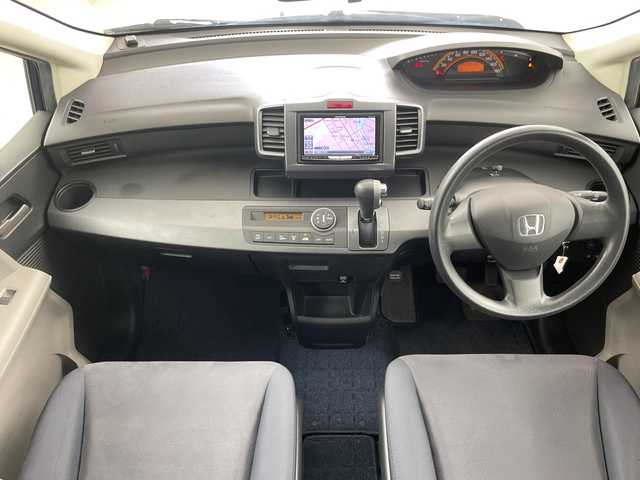 ホンダ フリード G ジャストセレクション 道央・札幌 2010(平22)年 5.9万km プレミアムナイトブルーパール ・４WD/・コンフォートビューパッケージ/・社外ナビ（AVIC-ZH0009）/・Bluetooth/CD/DVD/USB/SD/フルセグTV/・バックカメラ/・リア左側パワースライドドア/・リア両側イージークローザー/・HIDライト/オートライト/・VSA(車両挙動安定化制御システム)/・リモコンキー/・Wエアバック/・ABS