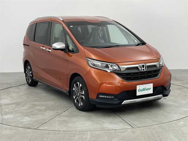 ホンダ フリード クロスター ホンダセンシング 愛知県 2020(令2)年 4.1万km プレミアムクリスタルオレンジM ホンダセンシング/・衝突軽減ブレーキ/・レーダークルーズコントロール　/・横滑り防止装置/・衝突軽減ブレーキ/・車線逸脱装置/純正ナビ/・Bluetooth/・フルセグTV/ステアリングリモコン/バックカメラ　/ハーフレザー　/ビルトインＥＴＣ　/ＵＳＢ　/両側パワースライドドア/ルーフレール　/ＬＥＤライト　/スマートキー　/アルミホイール　/ウォークスルー　