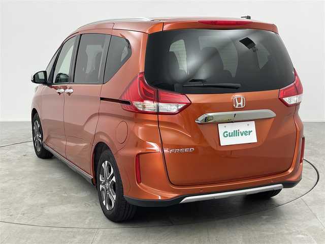 ホンダ フリード クロスター ホンダセンシング 愛知県 2020(令2)年 4.1万km プレミアムクリスタルオレンジM ホンダセンシング/・衝突軽減ブレーキ/・レーダークルーズコントロール　/・横滑り防止装置/・衝突軽減ブレーキ/・車線逸脱装置/純正ナビ/・Bluetooth/・フルセグTV/ステアリングリモコン/バックカメラ　/ハーフレザー　/ビルトインＥＴＣ　/ＵＳＢ　/両側パワースライドドア/ルーフレール　/ＬＥＤライト　/スマートキー　/アルミホイール　/ウォークスルー　