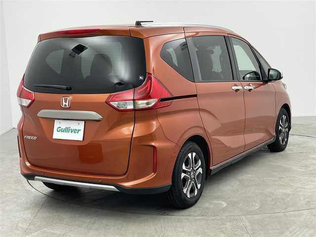 ホンダ フリード クロスター ホンダセンシング 愛知県 2020(令2)年 4.1万km プレミアムクリスタルオレンジM ホンダセンシング/・衝突軽減ブレーキ/・レーダークルーズコントロール　/・横滑り防止装置/・衝突軽減ブレーキ/・車線逸脱装置/純正ナビ/・Bluetooth/・フルセグTV/ステアリングリモコン/バックカメラ　/ハーフレザー　/ビルトインＥＴＣ　/ＵＳＢ　/両側パワースライドドア/ルーフレール　/ＬＥＤライト　/スマートキー　/アルミホイール　/ウォークスルー　