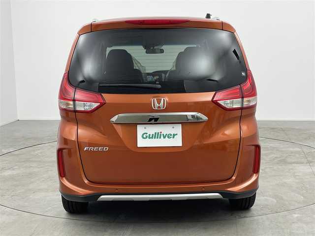 ホンダ フリード クロスター ホンダセンシング 愛知県 2020(令2)年 4.1万km プレミアムクリスタルオレンジM ホンダセンシング/・衝突軽減ブレーキ/・レーダークルーズコントロール　/・横滑り防止装置/・衝突軽減ブレーキ/・車線逸脱装置/純正ナビ/・Bluetooth/・フルセグTV/ステアリングリモコン/バックカメラ　/ハーフレザー　/ビルトインＥＴＣ　/ＵＳＢ　/両側パワースライドドア/ルーフレール　/ＬＥＤライト　/スマートキー　/アルミホイール　/ウォークスルー　
