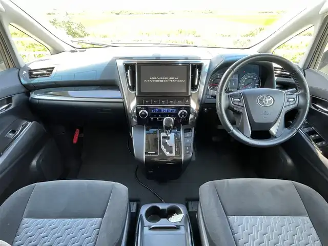 トヨタ ヴェルファイア Z 佐賀県 2015(平27)年 6.7万km ホワイトパールクリスタルシャイン 純正10型SDナビゲーション【NSZT-ZA4T】/・BT CD DVD AM FM フルセグTV/バックカメラ/純正11型フリップダウンモニター/両側パワースライドドア/ビルトインETC2.0/前後ドライブレコーダー/革巻きステアリング/・ステアリングリモコン/電子パーキング/AUTO HOLD/ＬＥＤヘッドライト/・オートライト/スマートキー/純正18インチアルミホイール/純正フロアマット/純正ドアバイザー/クリアランスソナー