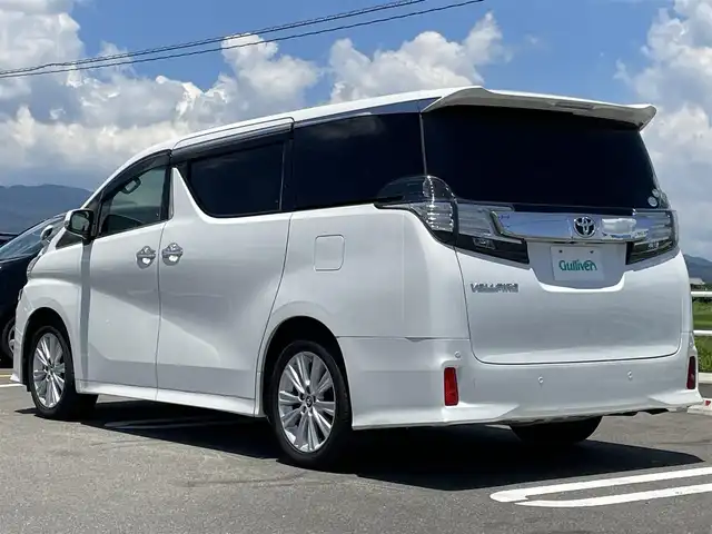 トヨタ ヴェルファイア Z 佐賀県 2015(平27)年 6.7万km ホワイトパールクリスタルシャイン 純正10型SDナビゲーション【NSZT-ZA4T】/・BT CD DVD AM FM フルセグTV/バックカメラ/純正11型フリップダウンモニター/両側パワースライドドア/ビルトインETC2.0/前後ドライブレコーダー/革巻きステアリング/・ステアリングリモコン/電子パーキング/AUTO HOLD/ＬＥＤヘッドライト/・オートライト/スマートキー/純正18インチアルミホイール/純正フロアマット/純正ドアバイザー/クリアランスソナー