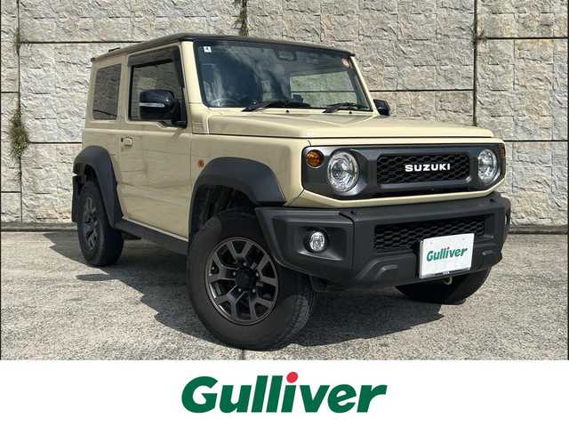 スズキ ジムニー シエラ JC 長崎県 2022(令4)年 2.2万km シフォンアイボリーメタリックブラック2トーンルーフ 社外9インチナビ/（CD/DVD/BT/フルセグ）/バックカメラ/衝突軽減システム/レーンアシスト/クルーズコントロール/シートヒーター/ステアリングスイッチ/前後ドライブレコーダー/マッドガード/オートライト/ETC/純正15インチAW