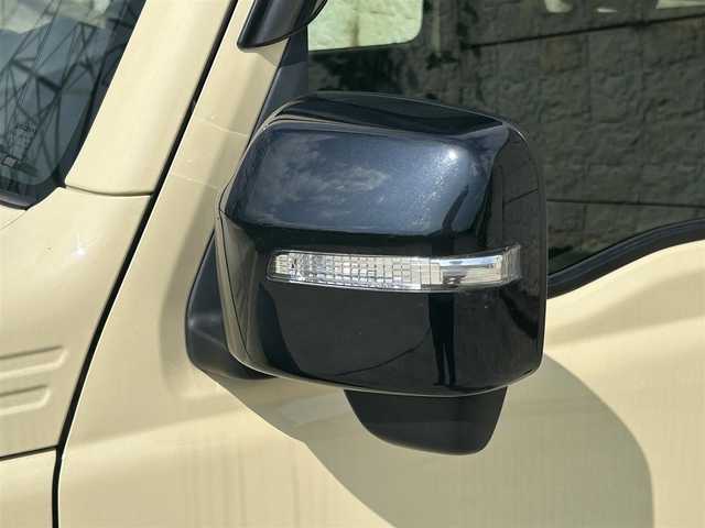 スズキ ジムニー シエラ JC 長崎県 2022(令4)年 2.2万km シフォンアイボリーメタリックブラック2トーンルーフ 社外9インチナビ/（CD/DVD/BT/フルセグ）/バックカメラ/衝突軽減システム/レーンアシスト/クルーズコントロール/シートヒーター/ステアリングスイッチ/前後ドライブレコーダー/マッドガード/オートライト/ETC/純正15インチAW