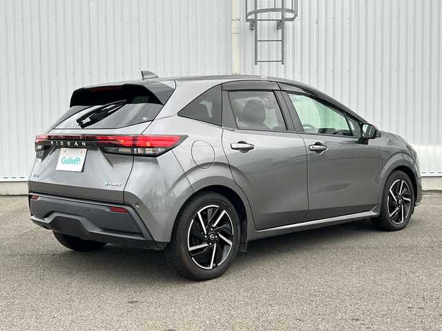日産 ノート X 愛媛県 2022(令4)年 1.3万km ダークメタルグレー 純正ディスプレイオーディオ/デジタルインナーミラー/ETC/バックカメラ/全方位カメラ/ドライブレコーダー前後/コーナーセンサー/オートライト/オートLEDヘッドライト/純正16インチAW/BSM/横滑り防止装置