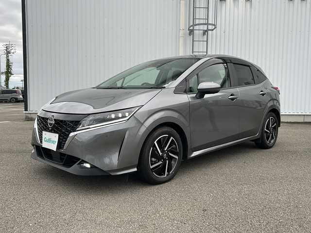 日産 ノート X 愛媛県 2022(令4)年 1.3万km ダークメタルグレー 純正ディスプレイオーディオ/デジタルインナーミラー/ETC/バックカメラ/全方位カメラ/ドライブレコーダー前後/コーナーセンサー/オートライト/オートLEDヘッドライト/純正16インチAW/BSM/横滑り防止装置