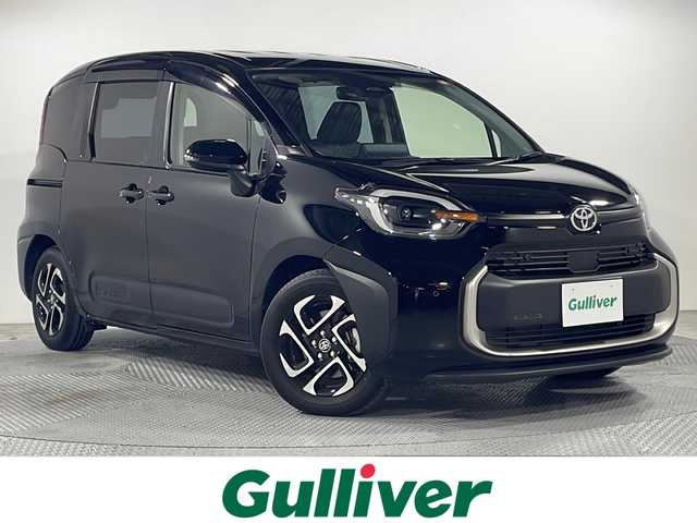 トヨタ シエンタ ハイブリッド Z 広島県 2023(令5)年 0.8万km ブラック 純正10.5型ディスプレイオーディオ（スマホ連携/フルセグTV/Bluetooth）/両側パワースライドドア/バックカメラ/セーフティンセンス/・プリクラッシュセーフティ/・レーントレーシングアシスト/・レーンディパーチャーアラート/・レーダークルーズコントロール/・アダプティブハイビーム/・プロアクティブドライビングアシスト/ブラインドスポットモニター/パーキングサポートブレーキ/LEDヘッドランプ/純正15インチAW/AC100V/1500W電源/ETC2.0/前後ドライブレコーダー/USB入力端子