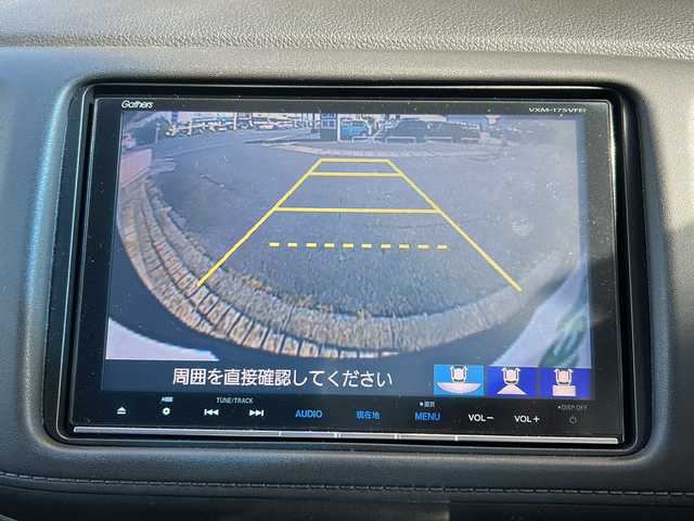 ホンダ ヴェゼル ハイブリッド 静岡県 2017(平29)年 7.2万km クリスタルブラックパール 純正SDナビ/・CD/・DVD/・フルセグＴＶ/・Bluetooth/・HDMI/・USB/・AM/・FM/主要装備/・衝突軽減/・レーンキープ/・追従クルコン/・バックカメラ/・ETC/・ドラレコ/・ハーフレザーシート/・シートヒーターD/N席/・ヒーテッドドアミラー/・ルーフレール/・LEDヘッドライト/・オートライト/・フォグランプ/・パドルシフト/・純正フロアマット/・純正アルミホイール