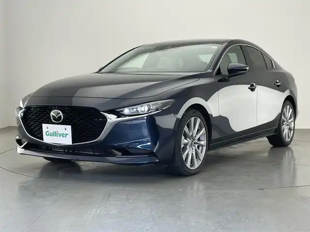 マツダ マツダ３セダン 20S Lパッケージ 愛知県 2021(令3)年 2.4万km ディープクリスタルブルーマイカ 純正ナビ　白革　シートヒーター　禁煙　フルセグＴＶ　全方位カメラ　ＤＶＤ　純正前後ドラレコ　ＥＴＣ　３６０°セーフティパッケージ　衝突軽減装置　追従クルコン　ＨＵＤ　パドルシフト　ＬＥＤオートライト　パーキングセンサー　