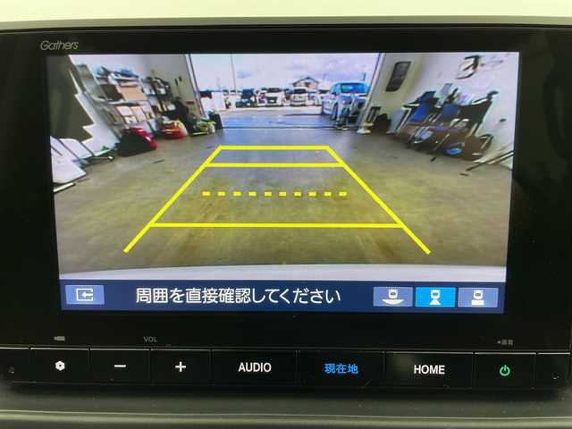 ホンダ フリード AIR 富山県 2024(令6)年 0.8万km プラチナホワイトパール 純正8型ナビ（AM/FM/BT/USB/フルセグ）/バックカメラ/ETC/両側パワースライドドア/衝突被害軽減システム/レーダークルーズコントロール/レーンキープアシスト/コーナーセンサー/横滑り防止装置/アイドリングストップ/オートホールド付電子パーキング/オートLEDライト/オートマチックハイビーム/純正フロアマット/ステアリングスイッチ