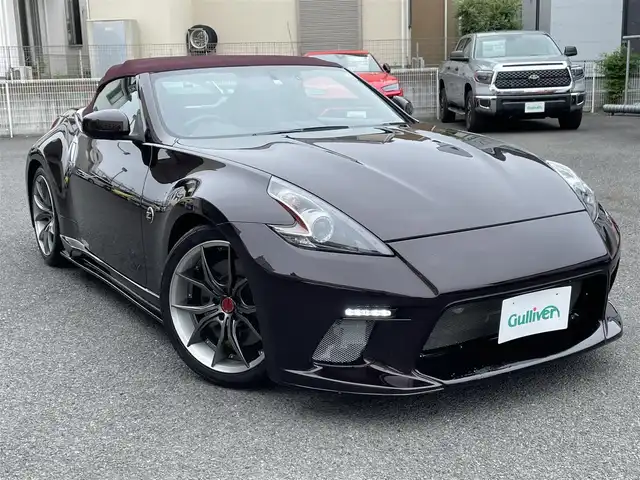 日産 フェアレディ Ｚ ロードスター バージョンST 神奈川県 2009(平21)年 3.5万km プレミアムディープマルーン 社外エアロ(F/S/R)/RAYS19インチAW/紫革シート/純正HDDナビ・地デジTV/純正CD/DVD/MSV/BT再生/バックモニター/ビルトインETC/360°ドライブレコーダー/前席パワーシート/シートヒーター/エアシート/電動オープン/HIDライト/ステアリングスイッチ/電格ミラー/パドルシフト/プッシュスタート/インテリキー×2/H22/23/24/25/26/28/30/R4/5年整備記録/保証書・取説あり