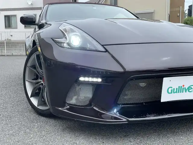 日産 フェアレディ Ｚ ロードスター バージョンST 神奈川県 2009(平21)年 3.5万km プレミアムディープマルーン 社外エアロ(F/S/R)/RAYS19インチAW/紫革シート/純正HDDナビ・地デジTV/純正CD/DVD/MSV/BT再生/バックモニター/ビルトインETC/360°ドライブレコーダー/前席パワーシート/シートヒーター/エアシート/電動オープン/HIDライト/ステアリングスイッチ/電格ミラー/パドルシフト/プッシュスタート/インテリキー×2/H22/23/24/25/26/28/30/R4/5年整備記録/保証書・取説あり