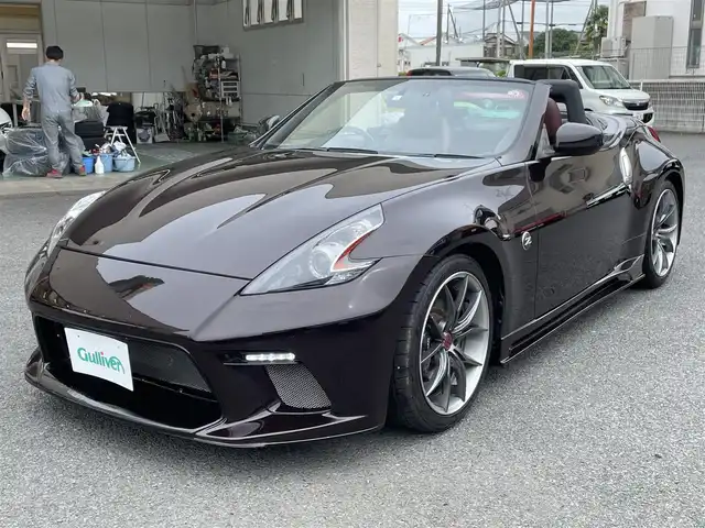 日産 フェアレディ Ｚ ロードスター バージョンST 神奈川県 2009(平21)年 3.5万km プレミアムディープマルーン 社外エアロ(F/S/R)/RAYS19インチAW/紫革シート/純正HDDナビ・地デジTV/純正CD/DVD/MSV/BT再生/バックモニター/ビルトインETC/360°ドライブレコーダー/前席パワーシート/シートヒーター/エアシート/電動オープン/HIDライト/ステアリングスイッチ/電格ミラー/パドルシフト/プッシュスタート/インテリキー×2/H22/23/24/25/26/28/30/R4/5年整備記録/保証書・取説あり
