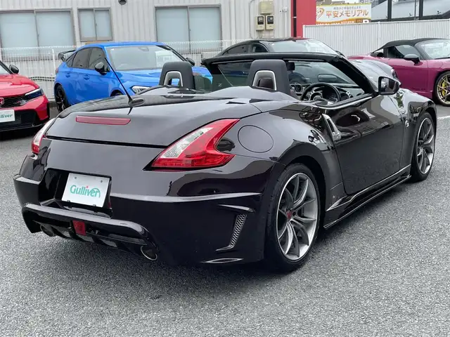 日産 フェアレディ Ｚ ロードスター バージョンST 神奈川県 2009(平21)年 3.5万km プレミアムディープマルーン 社外エアロ(F/S/R)/RAYS19インチAW/紫革シート/純正HDDナビ・地デジTV/純正CD/DVD/MSV/BT再生/バックモニター/ビルトインETC/360°ドライブレコーダー/前席パワーシート/シートヒーター/エアシート/電動オープン/HIDライト/ステアリングスイッチ/電格ミラー/パドルシフト/プッシュスタート/インテリキー×2/H22/23/24/25/26/28/30/R4/5年整備記録/保証書・取説あり